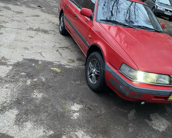 Красный Мазда 626, объемом двигателя 1.8 л и пробегом 324 тыс. км за 1650 $, фото 1 на Automoto.ua