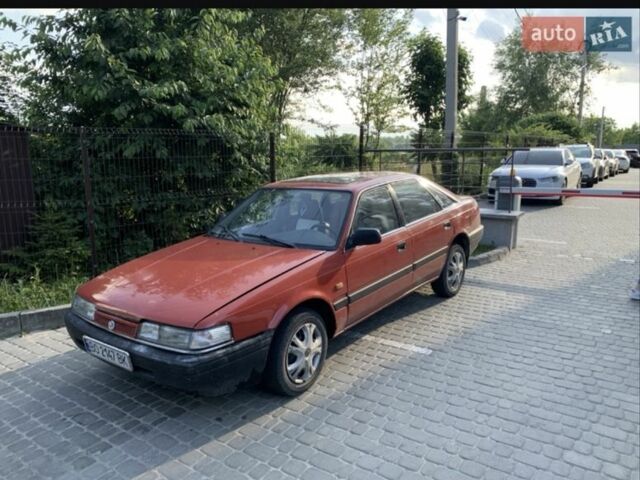 Красный Мазда 626, объемом двигателя 2 л и пробегом 500 тыс. км за 907 $, фото 1 на Automoto.ua