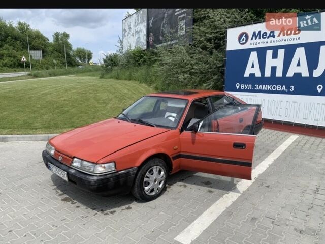 Красный Мазда 626, объемом двигателя 2 л и пробегом 500 тыс. км за 907 $, фото 6 на Automoto.ua