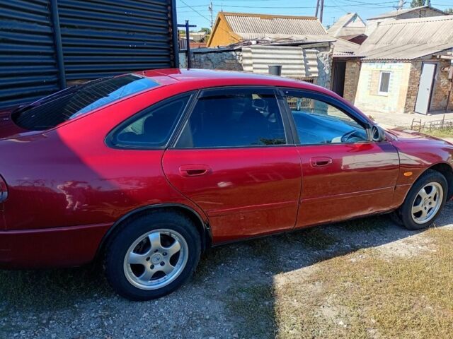 Червоний Мазда 626, об'ємом двигуна 2 л та пробігом 250 тис. км за 1750 $, фото 2 на Automoto.ua