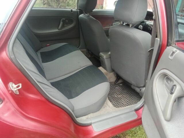 Красный Мазда 626, объемом двигателя 2 л и пробегом 350 тыс. км за 1999 $, фото 6 на Automoto.ua