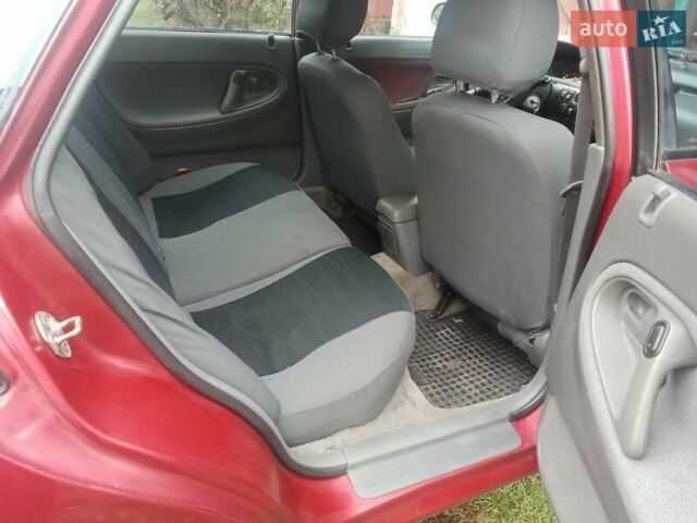 Красный Мазда 626, объемом двигателя 1.99 л и пробегом 350 тыс. км за 2600 $, фото 4 на Automoto.ua