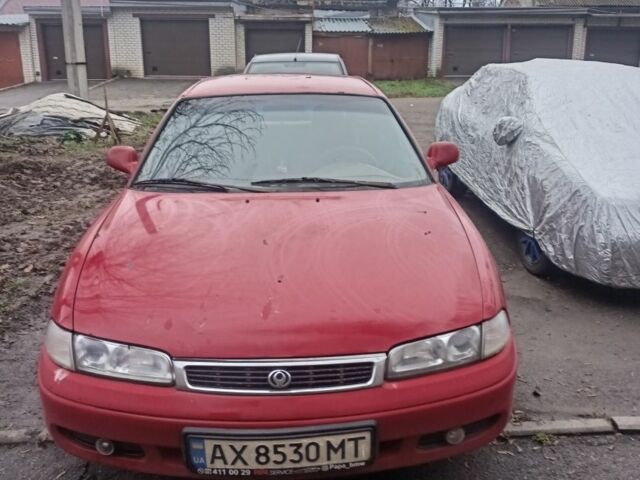 Красный Мазда 626, объемом двигателя 1.8 л и пробегом 247 тыс. км за 474 $, фото 11 на Automoto.ua