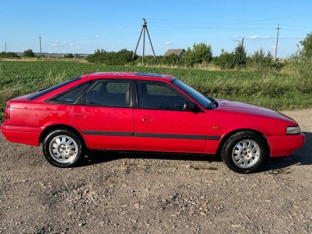 Красный Мазда 626, объемом двигателя 2 л и пробегом 311 тыс. км за 1100 $, фото 1 на Automoto.ua