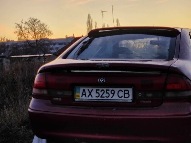 Красный Мазда 626, объемом двигателя 1.8 л и пробегом 370 тыс. км за 640 $, фото 1 на Automoto.ua