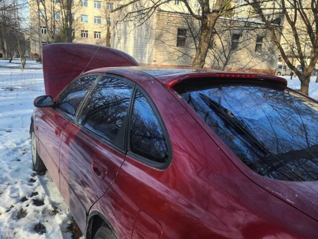 Красный Мазда 626, объемом двигателя 1.8 л и пробегом 370 тыс. км за 640 $, фото 3 на Automoto.ua