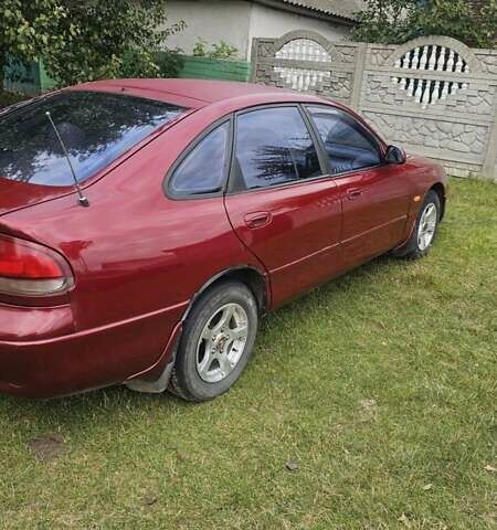 Красный Мазда 626, объемом двигателя 2 л и пробегом 455 тыс. км за 2000 $, фото 6 на Automoto.ua