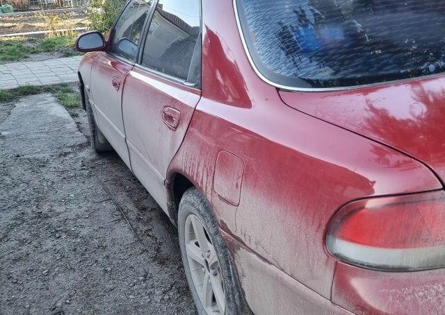 Червоний Мазда 626, об'ємом двигуна 2 л та пробігом 999 тис. км за 2000 $, фото 4 на Automoto.ua