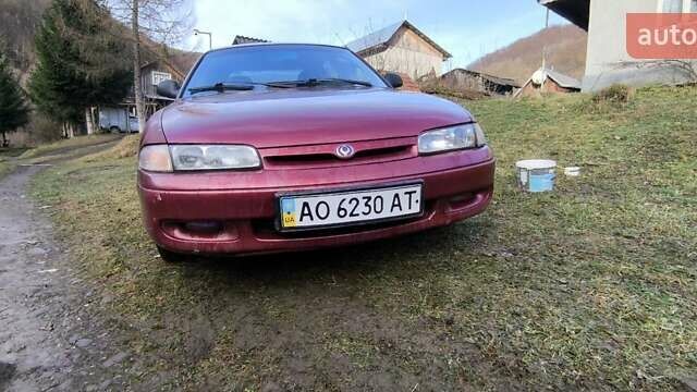 Красный Мазда 626, объемом двигателя 1.8 л и пробегом 219 тыс. км за 1700 $, фото 3 на Automoto.ua