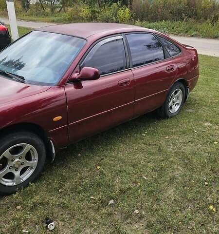 Красный Мазда 626, объемом двигателя 2 л и пробегом 455 тыс. км за 2000 $, фото 7 на Automoto.ua