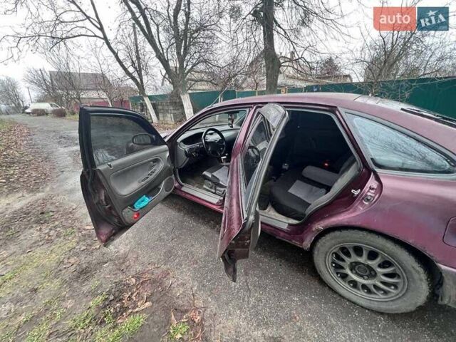 Красный Мазда 626, объемом двигателя 2 л и пробегом 413 тыс. км за 1500 $, фото 6 на Automoto.ua