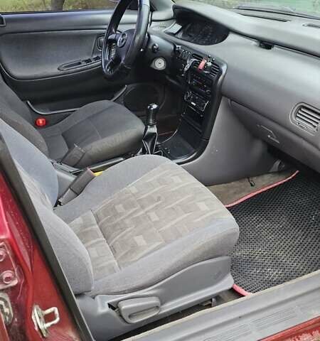 Красный Мазда 626, объемом двигателя 2 л и пробегом 455 тыс. км за 2000 $, фото 1 на Automoto.ua