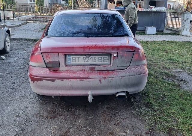 Червоний Мазда 626, об'ємом двигуна 2 л та пробігом 999 тис. км за 2000 $, фото 3 на Automoto.ua