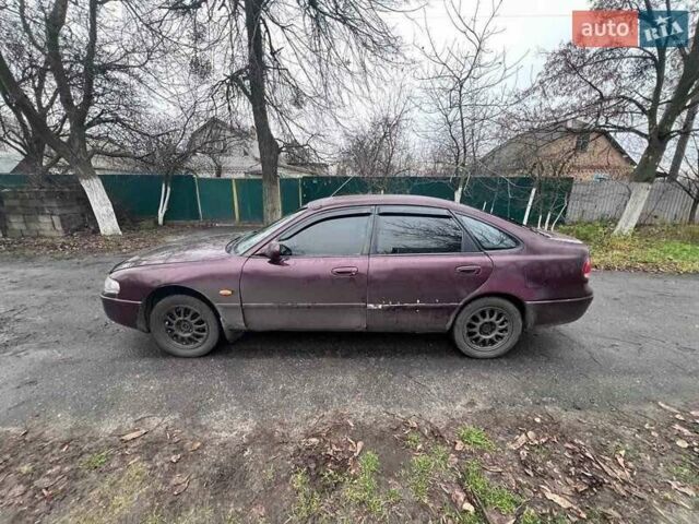 Красный Мазда 626, объемом двигателя 2 л и пробегом 413 тыс. км за 1500 $, фото 5 на Automoto.ua