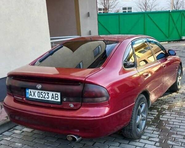 Красный Мазда 626, объемом двигателя 1.8 л и пробегом 257 тыс. км за 1200 $, фото 3 на Automoto.ua
