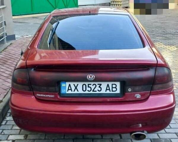 Красный Мазда 626, объемом двигателя 1.8 л и пробегом 257 тыс. км за 1200 $, фото 2 на Automoto.ua