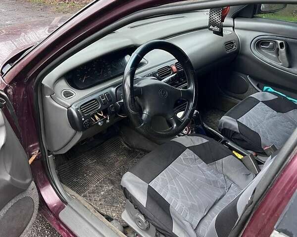 Красный Мазда 626, объемом двигателя 2 л и пробегом 413 тыс. км за 1500 $, фото 12 на Automoto.ua