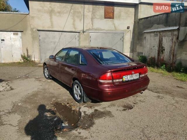 Красный Мазда 626, объемом двигателя 2 л и пробегом 390 тыс. км за 1400 $, фото 6 на Automoto.ua