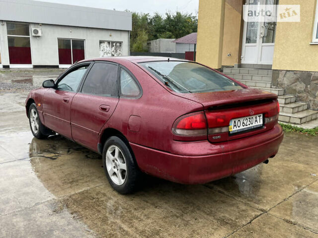 Красный Мазда 626, объемом двигателя 1.8 л и пробегом 200 тыс. км за 1200 $, фото 2 на Automoto.ua