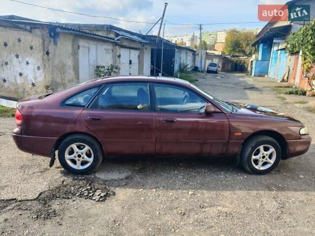 Красный Мазда 626, объемом двигателя 2 л и пробегом 390 тыс. км за 1400 $, фото 11 на Automoto.ua