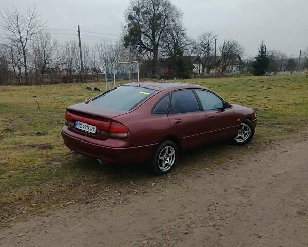 Красный Мазда 626, объемом двигателя 1.99 л и пробегом 398 тыс. км за 1300 $, фото 1 на Automoto.ua