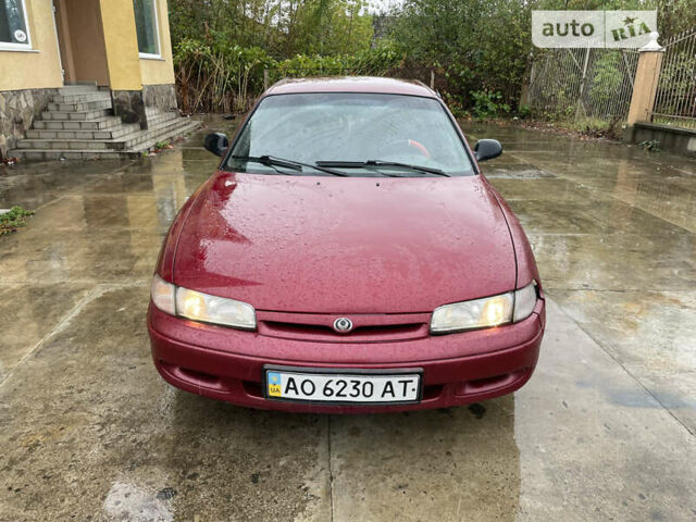Красный Мазда 626, объемом двигателя 1.8 л и пробегом 200 тыс. км за 1200 $, фото 1 на Automoto.ua