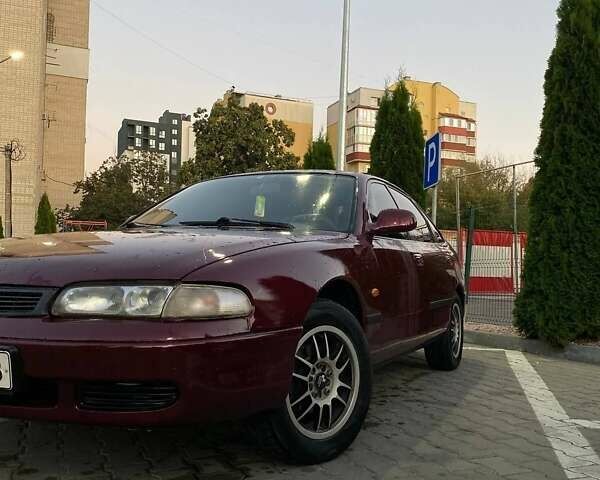 Красный Мазда 626, объемом двигателя 2 л и пробегом 323 тыс. км за 2700 $, фото 1 на Automoto.ua