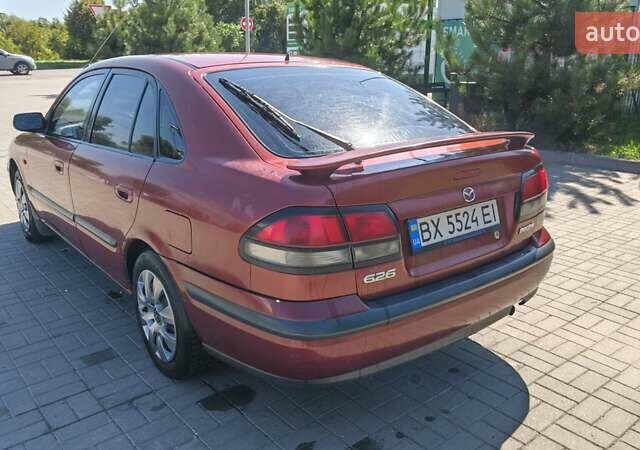 Красный Мазда 626, объемом двигателя 1.8 л и пробегом 340 тыс. км за 2200 $, фото 2 на Automoto.ua