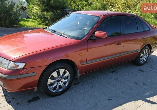 Красный Мазда 626, объемом двигателя 1.8 л и пробегом 340 тыс. км за 2200 $, фото 3 на Automoto.ua