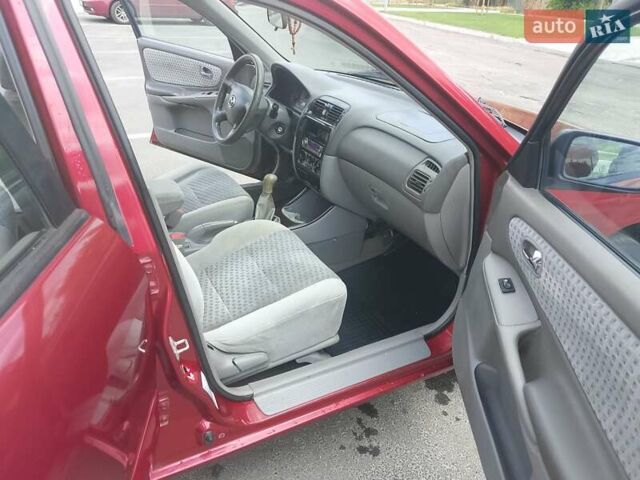 Червоний Мазда 626, об'ємом двигуна 1.8 л та пробігом 160 тис. км за 2600 $, фото 11 на Automoto.ua