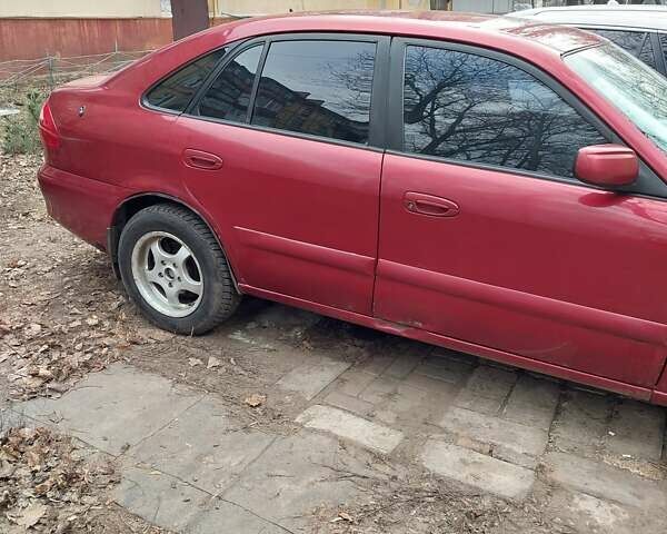 Красный Мазда 626, объемом двигателя 2 л и пробегом 246 тыс. км за 3700 $, фото 3 на Automoto.ua