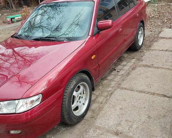 Красный Мазда 626, объемом двигателя 2 л и пробегом 246 тыс. км за 3700 $, фото 2 на Automoto.ua
