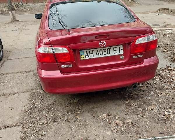 Красный Мазда 626, объемом двигателя 2 л и пробегом 246 тыс. км за 3700 $, фото 4 на Automoto.ua