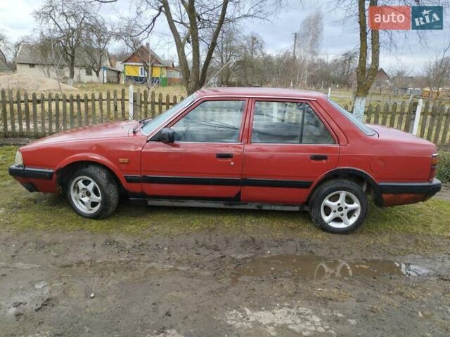 Красный Мазда 626, объемом двигателя 2 л и пробегом 346 тыс. км за 1400 $, фото 1 на Automoto.ua
