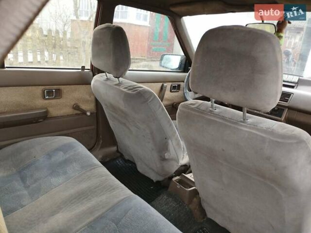 Красный Мазда 626, объемом двигателя 2 л и пробегом 346 тыс. км за 1400 $, фото 12 на Automoto.ua