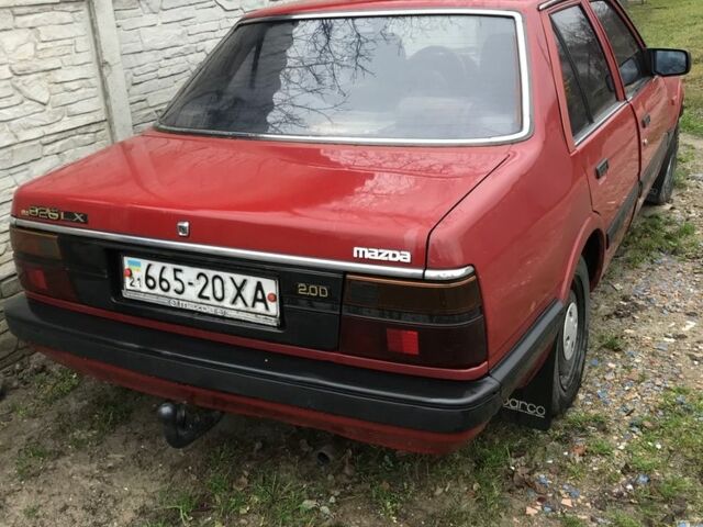 Красный Мазда 626, объемом двигателя 2 л и пробегом 999 тыс. км за 700 $, фото 1 на Automoto.ua