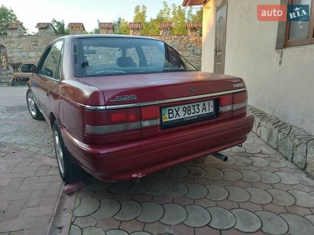 Красный Мазда 626, объемом двигателя 1.8 л и пробегом 111 тыс. км за 800 $, фото 1 на Automoto.ua
