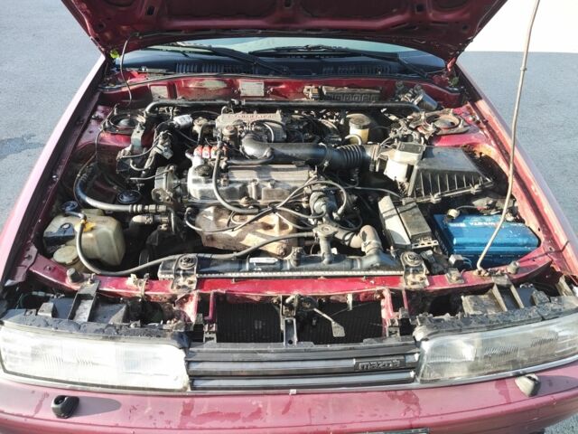 Красный Мазда 626, объемом двигателя 2 л и пробегом 226 тыс. км за 1200 $, фото 5 на Automoto.ua