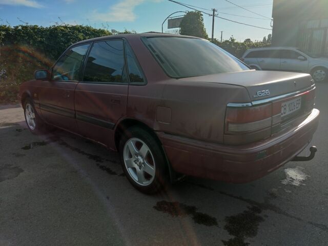 Красный Мазда 626, объемом двигателя 2 л и пробегом 226 тыс. км за 1200 $, фото 3 на Automoto.ua