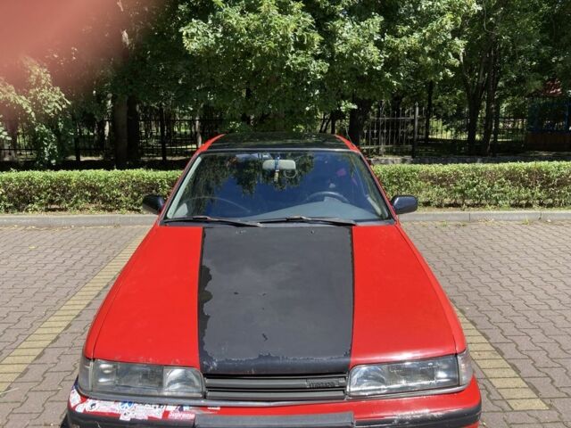 Червоний Мазда 626, об'ємом двигуна 2 л та пробігом 240 тис. км за 478 $, фото 5 на Automoto.ua
