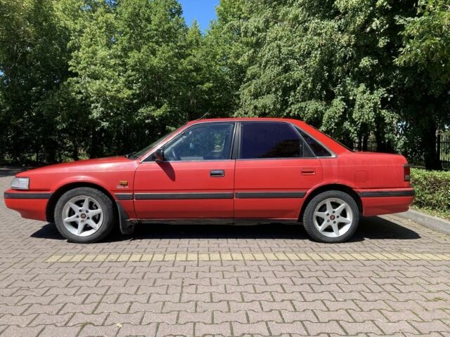 Червоний Мазда 626, об'ємом двигуна 2 л та пробігом 240 тис. км за 478 $, фото 1 на Automoto.ua