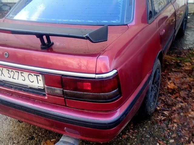 Червоний Мазда 626, об'ємом двигуна 2 л та пробігом 365 тис. км за 450 $, фото 1 на Automoto.ua