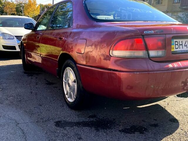 Червоний Мазда 626, об'ємом двигуна 1.8 л та пробігом 0 тис. км за 1050 $, фото 3 на Automoto.ua