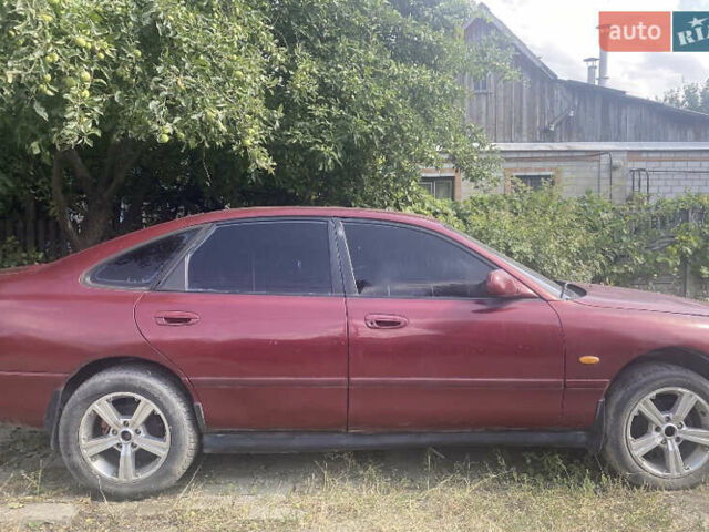 Червоний Мазда 626, об'ємом двигуна 2 л та пробігом 258 тис. км за 960 $, фото 1 на Automoto.ua