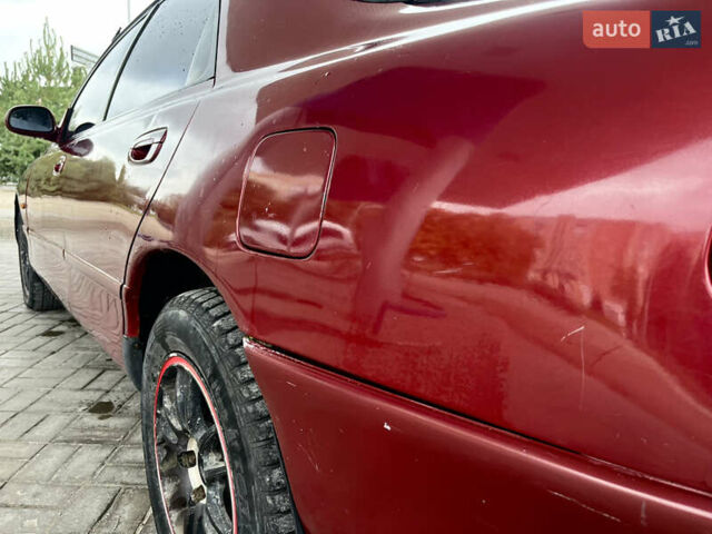 Червоний Мазда 626, об'ємом двигуна 2 л та пробігом 300 тис. км за 2299 $, фото 10 на Automoto.ua