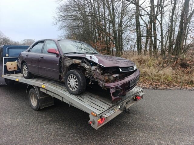 Красный Мазда 626, объемом двигателя 0 л и пробегом 300 тыс. км за 670 $, фото 3 на Automoto.ua