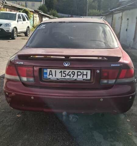 Красный Мазда 626, объемом двигателя 1.99 л и пробегом 380 тыс. км за 1500 $, фото 4 на Automoto.ua