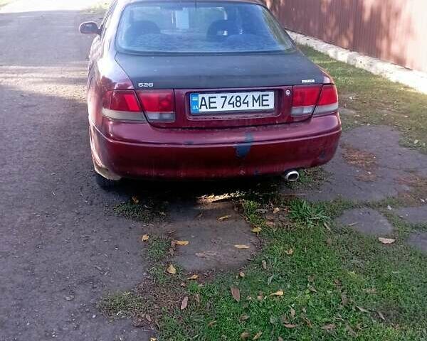 Красный Мазда 626, объемом двигателя 2 л и пробегом 440 тыс. км за 1857 $, фото 3 на Automoto.ua