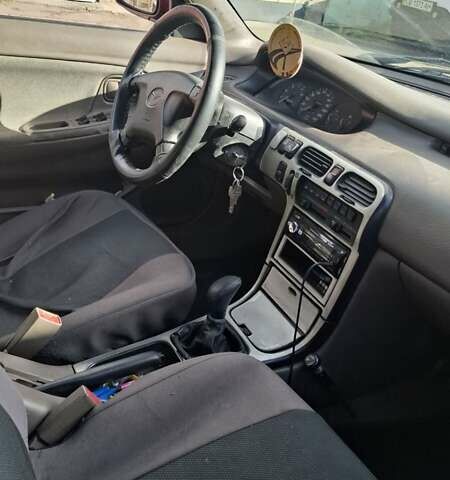 Красный Мазда 626, объемом двигателя 1.99 л и пробегом 380 тыс. км за 1500 $, фото 1 на Automoto.ua