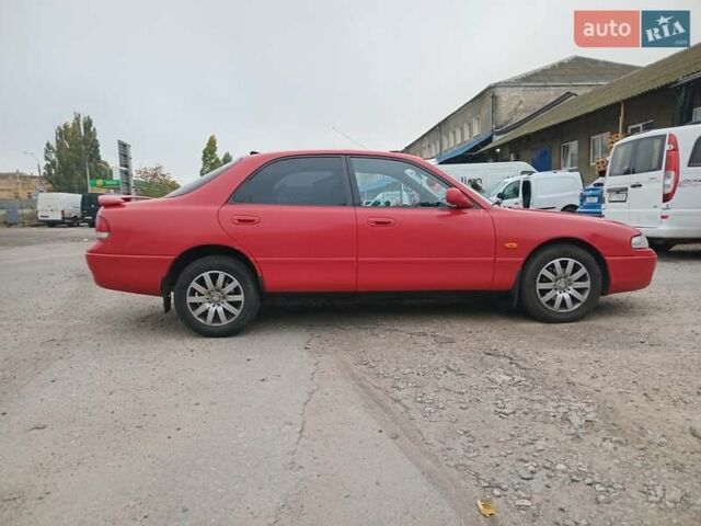 Красный Мазда 626, объемом двигателя 2 л и пробегом 210 тыс. км за 2600 $, фото 3 на Automoto.ua